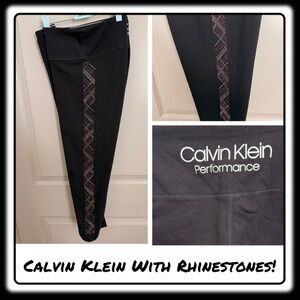 Calvin Klein Performance leggings
With pink & white Rhinestones Size XL